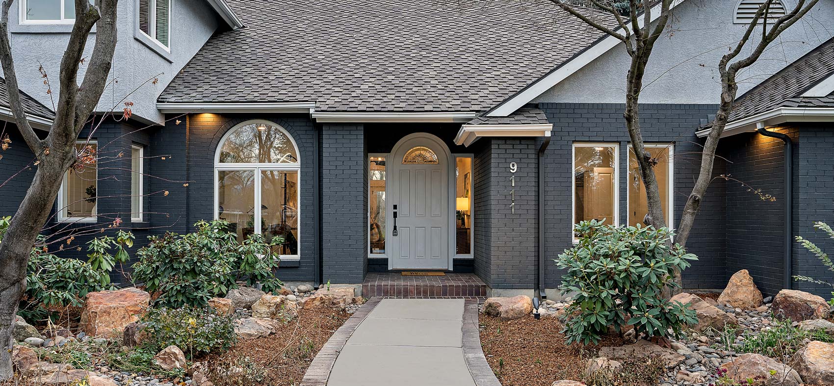 Painted Brick Home with White Front Door